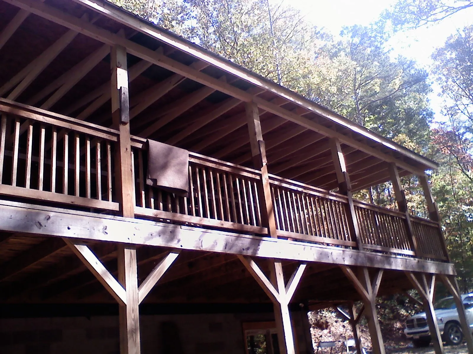 Timber framing under a new elevated porch and deck — Roof Leak Repair in Aurora by Roofing Brothers
